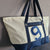 Recycled boat sail travel bag made in France