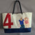 large sail bag painted by cécile colombo in boat sail made in france