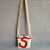 Mini shoulder bag made of recycled boat sail les toiles du large made in france